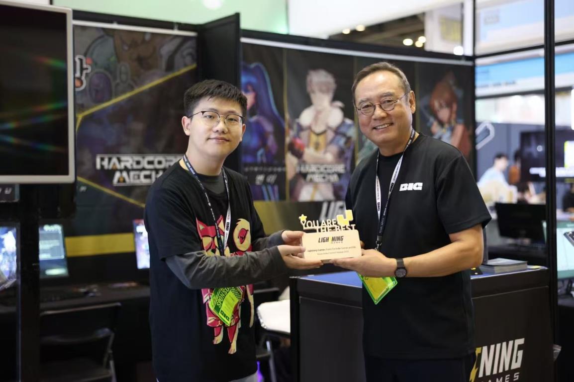 Receiving a commemorative award at BIC Festival.