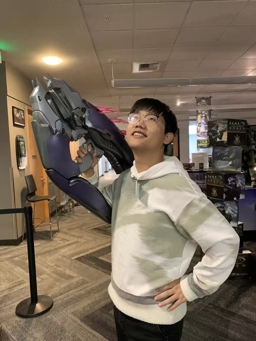 Trying a Halo display prop during a work visit to Xbox headquarters in Seattle
